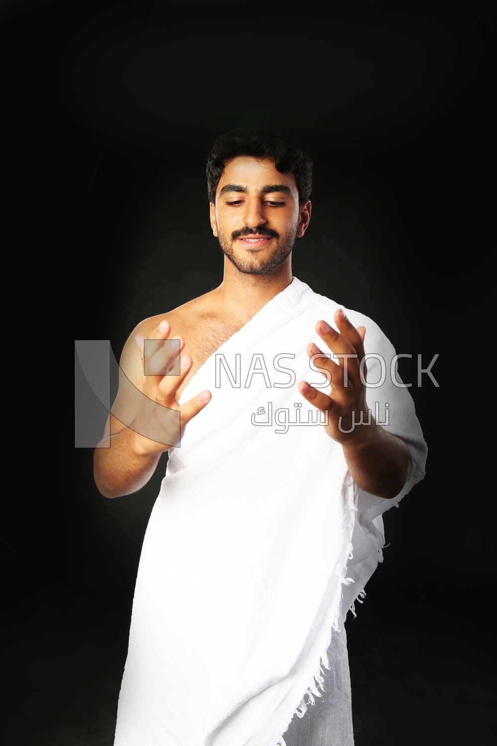 A man wearing an ihram dress