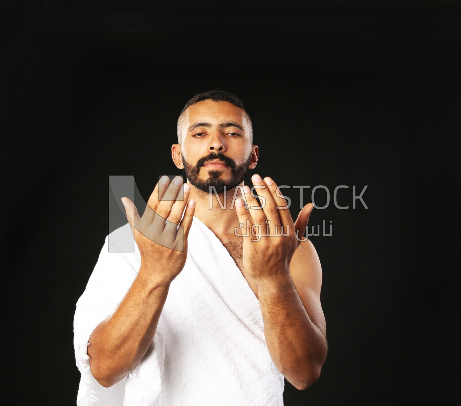 A man wearing an ihram dress
