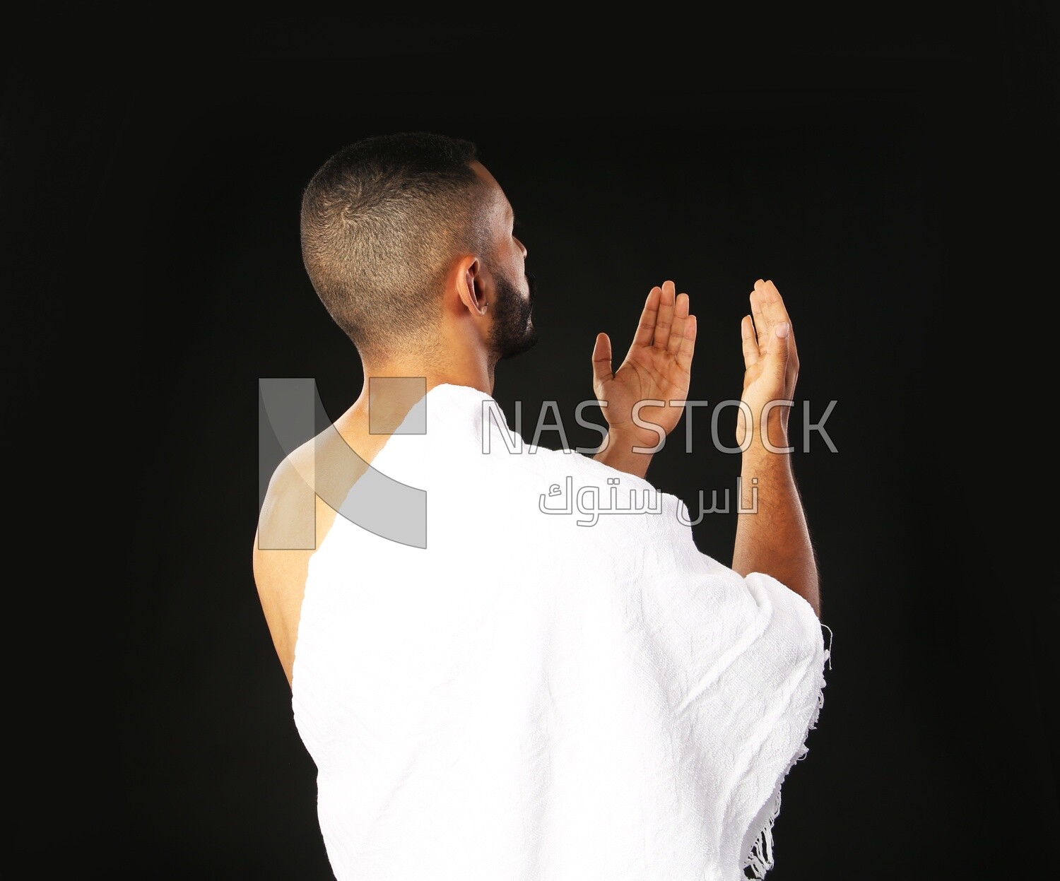 A man wearing an ihram dress