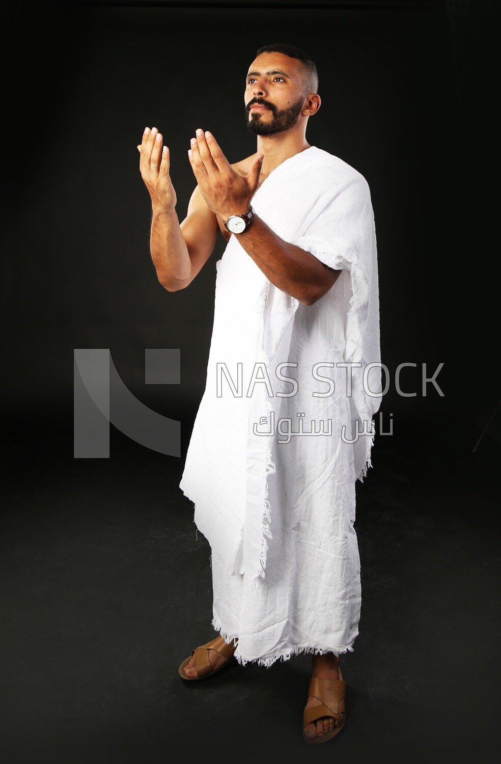 A man wearing an ihram dress
