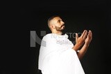 A man wearing an ihram dress