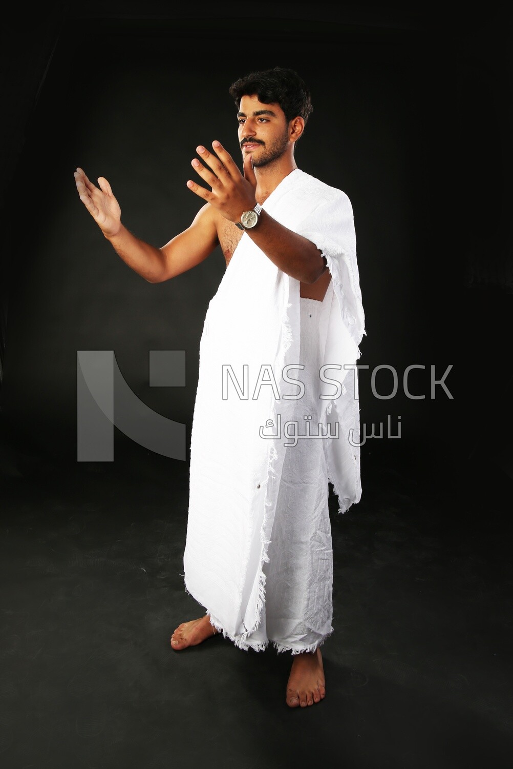 A man wearing an ihram dress