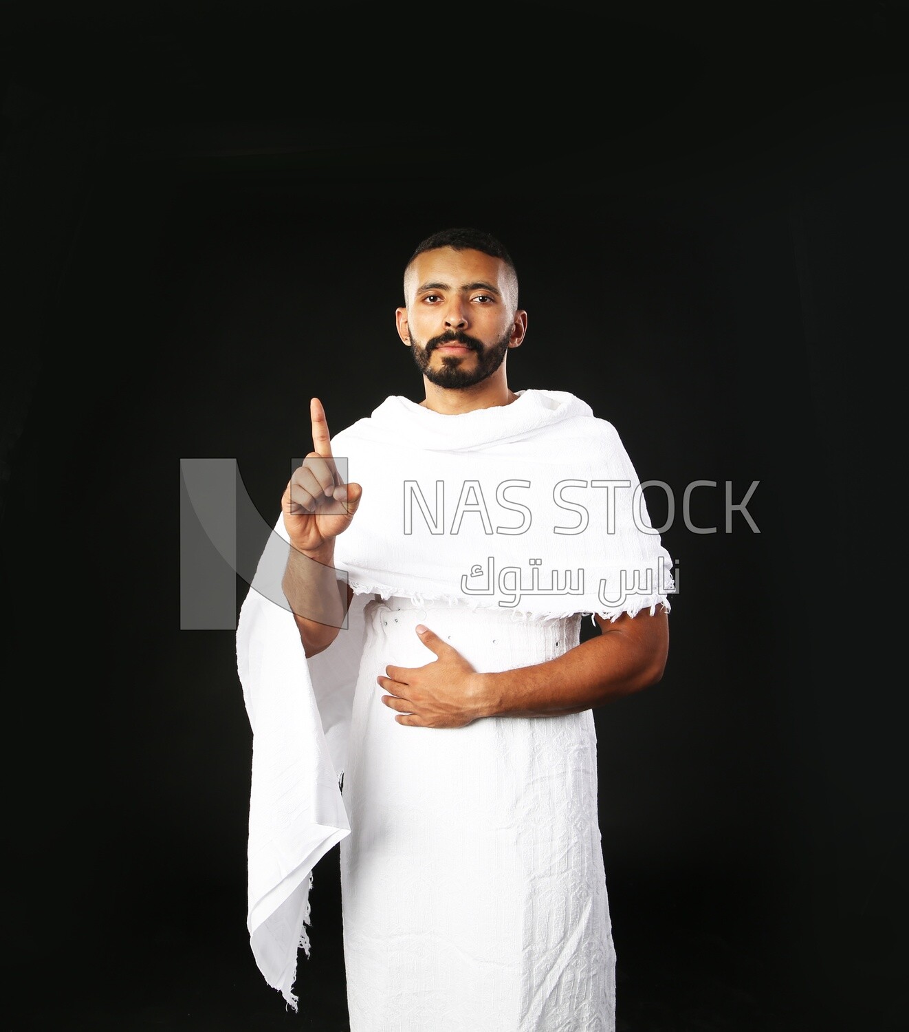 A man wearing an ihram dress