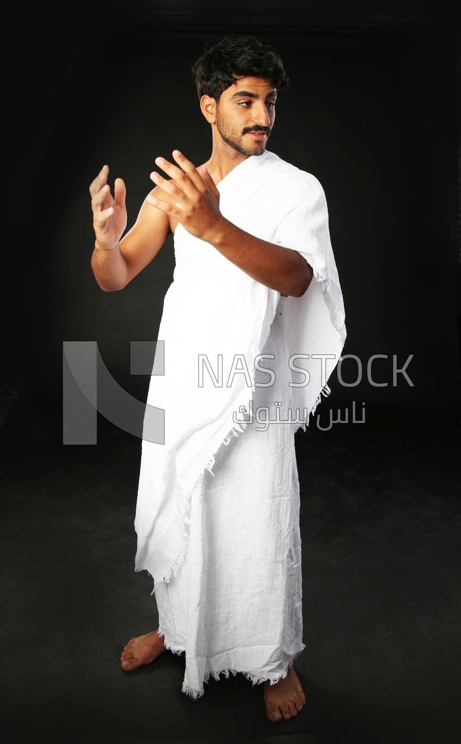 A man wearing an ihram dress