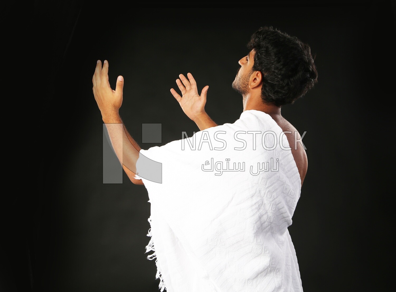 A man wearing an ihram dress