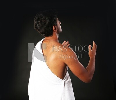 A man wearing an ihram dress