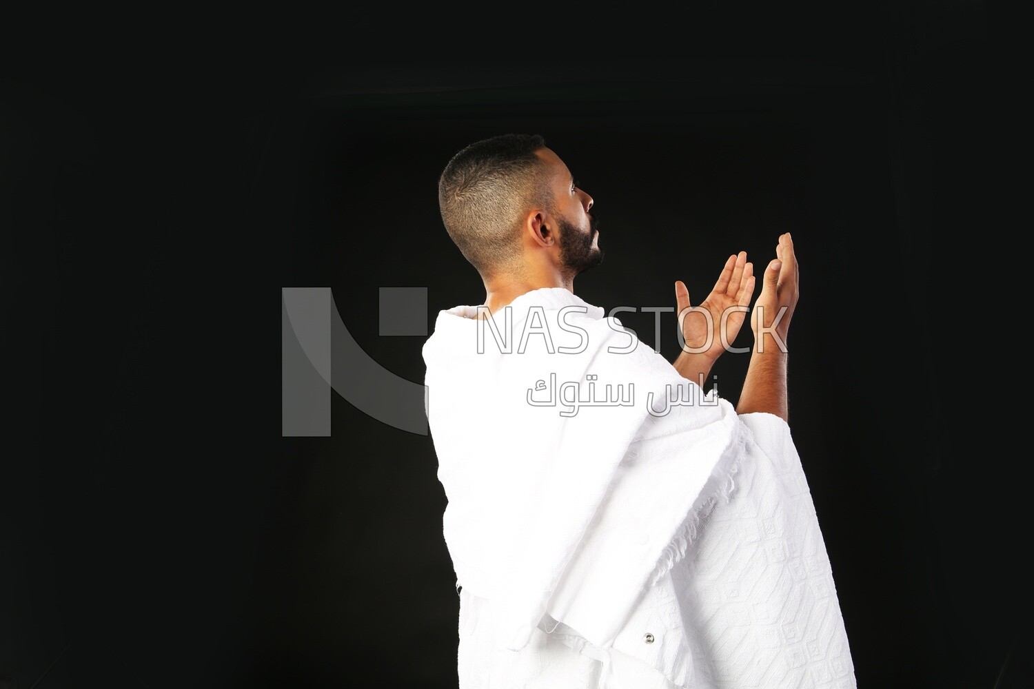A man wearing an ihram dress