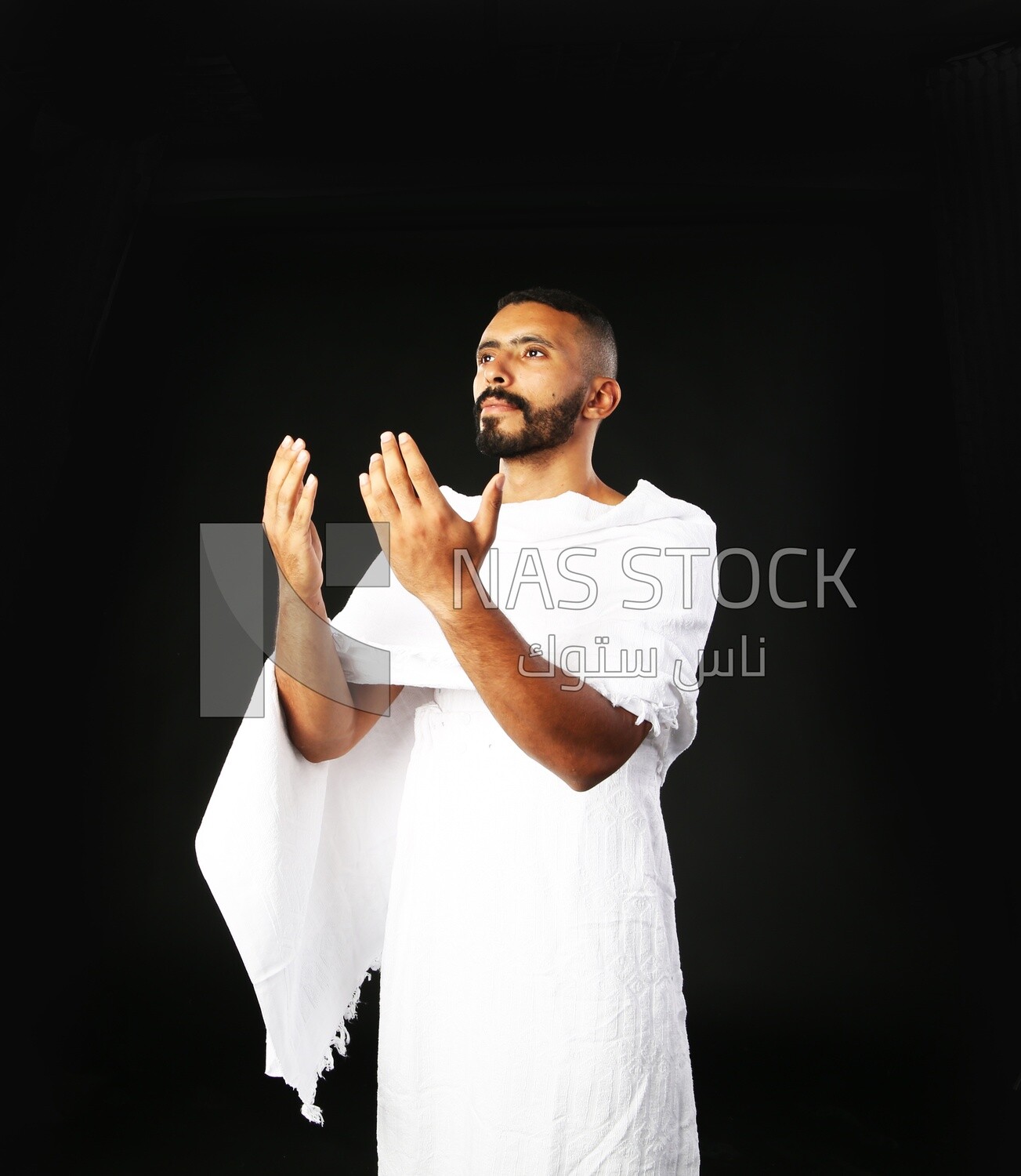 A man wearing an ihram dress