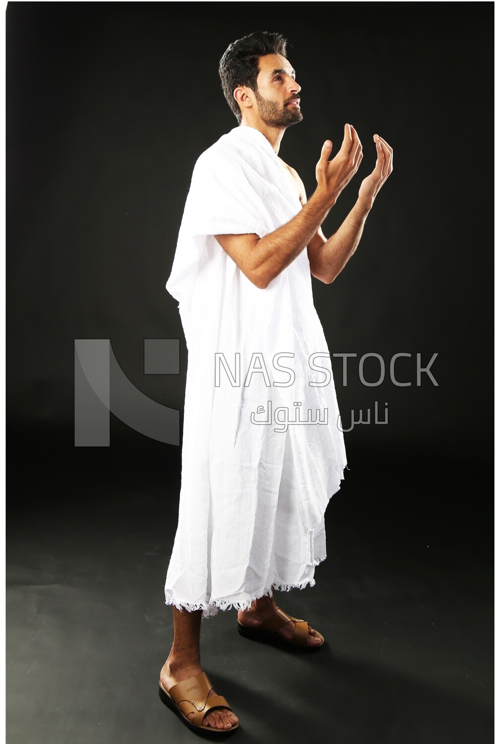 A man wearing an ihram dress