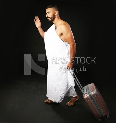 A man wearing an ihram dress