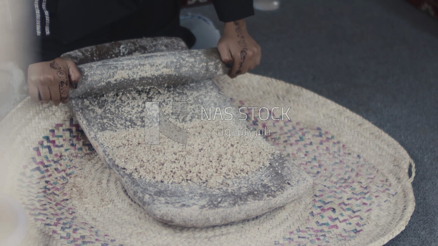 Woman baking in the Asir region, Saudi Arabia