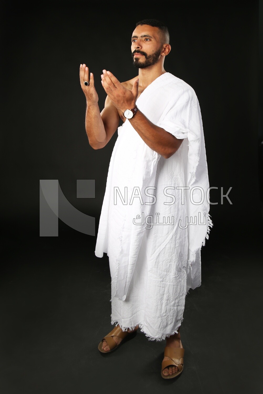 A man wearing an ihram dress