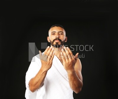 A man wearing an ihram dress