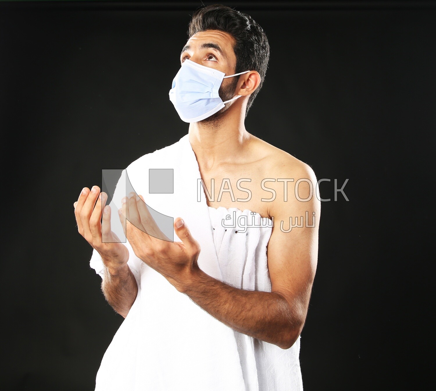 A man wearing an ihram dress