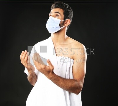 A man wearing an ihram dress