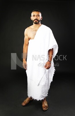 A man wearing an ihram dress
