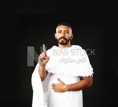 A man wearing an ihram dress