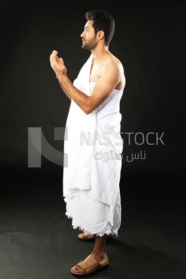 A man wearing an ihram dress