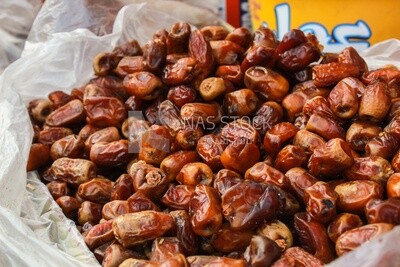 bag full of dates in a grocery store
