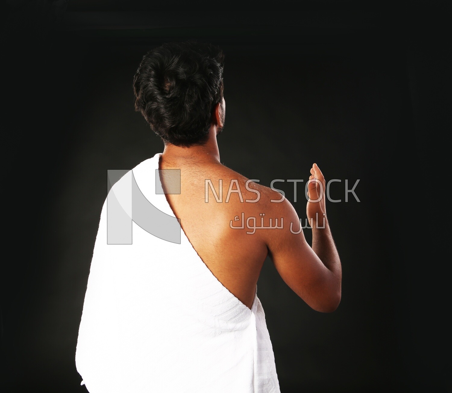 A man wearing an ihram dress
