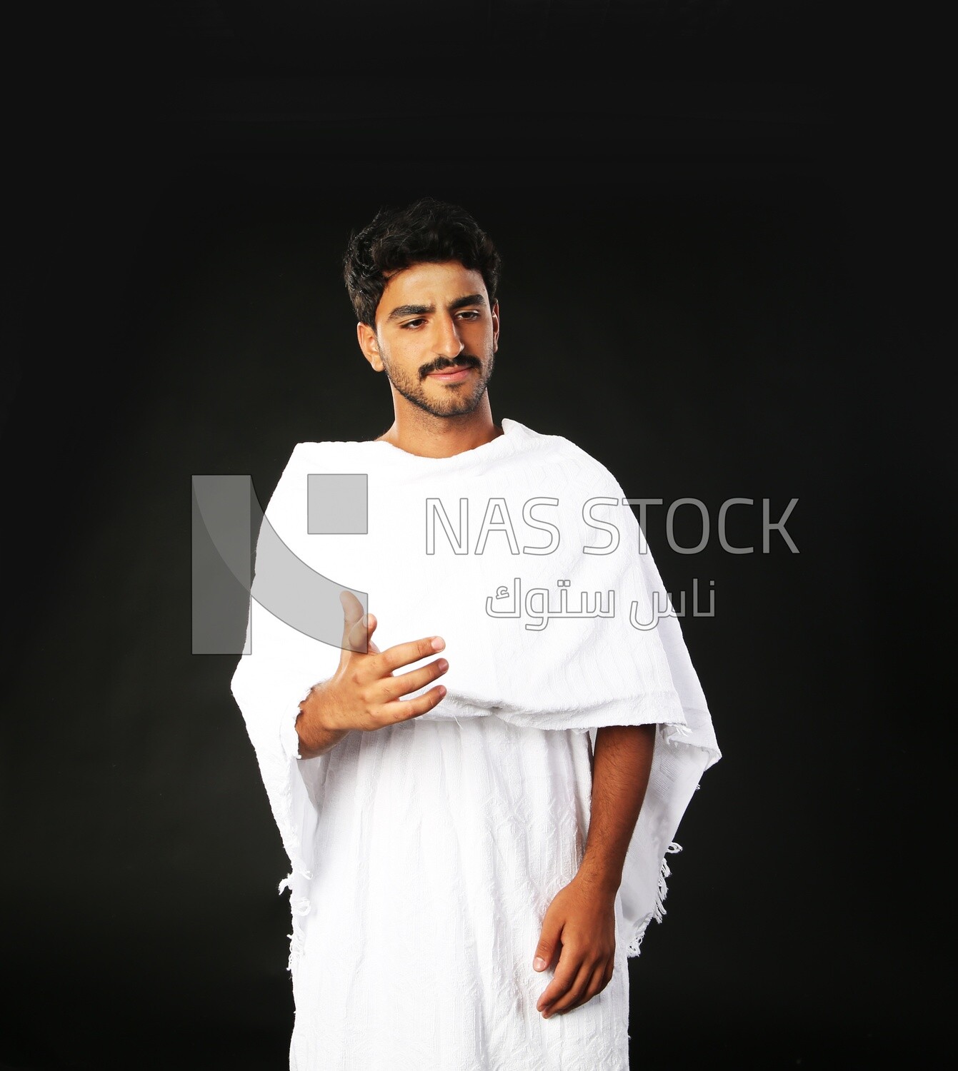 A man wearing an ihram dress