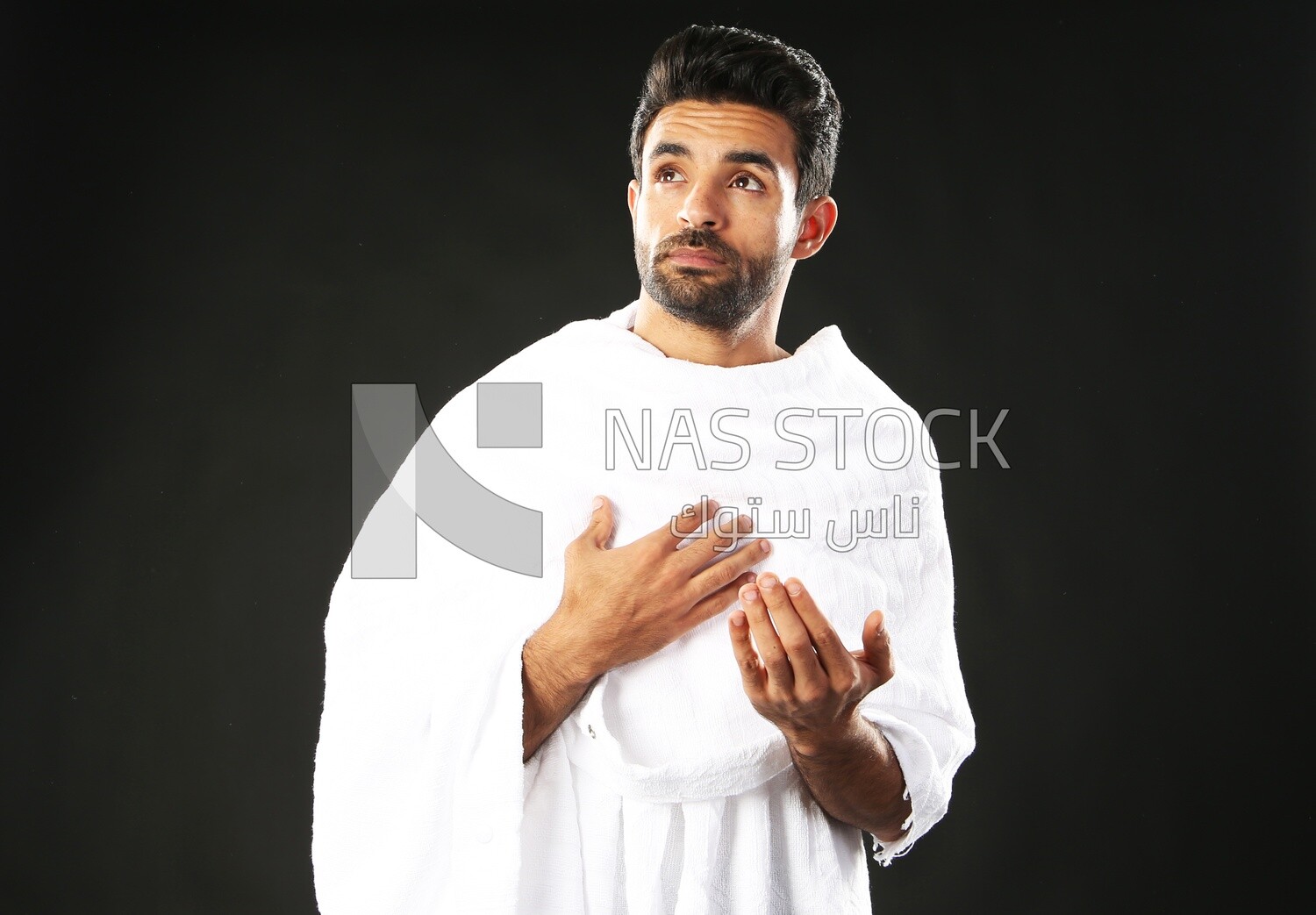 A man wearing an ihram dress
