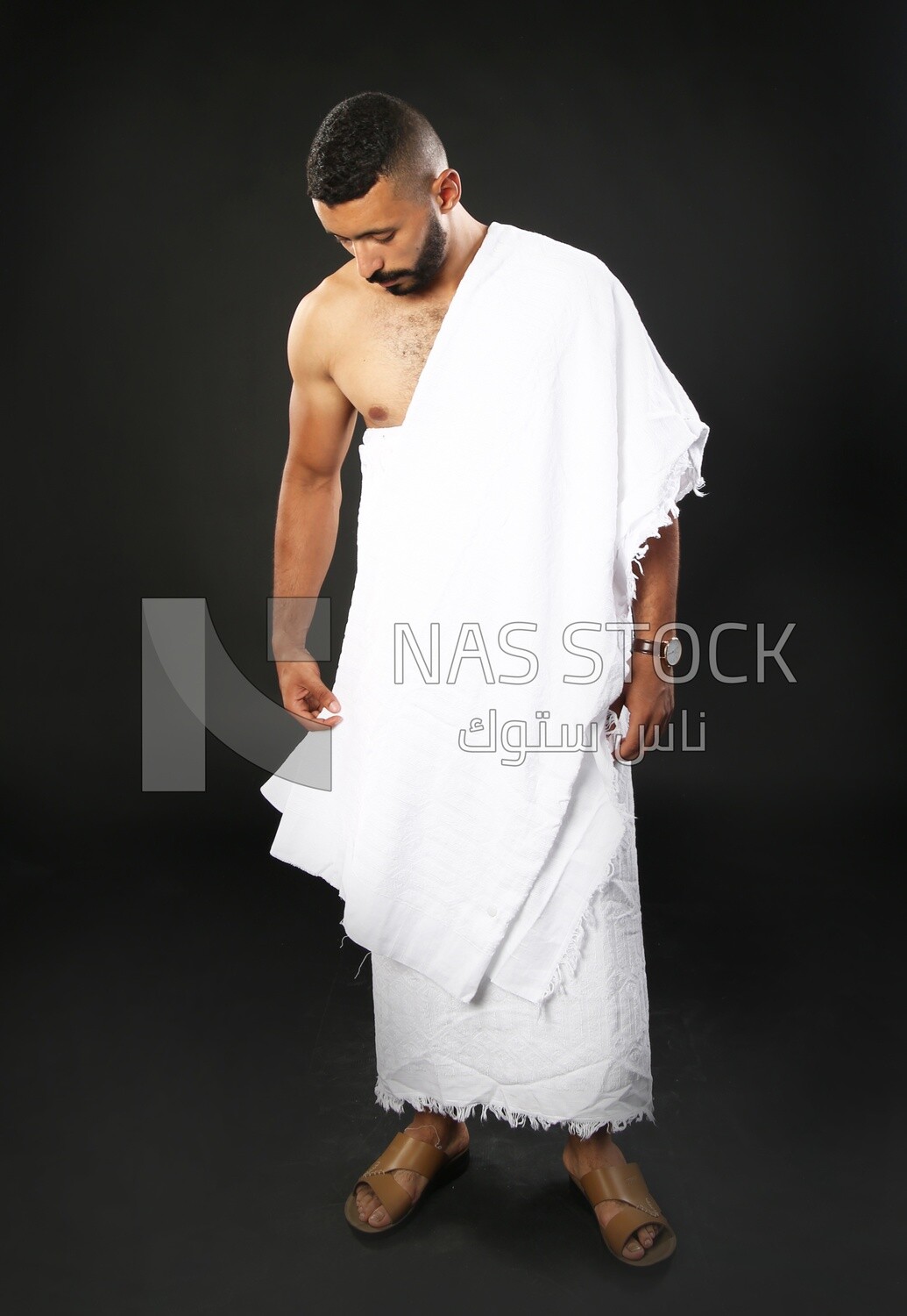 A man wearing an ihram dress
