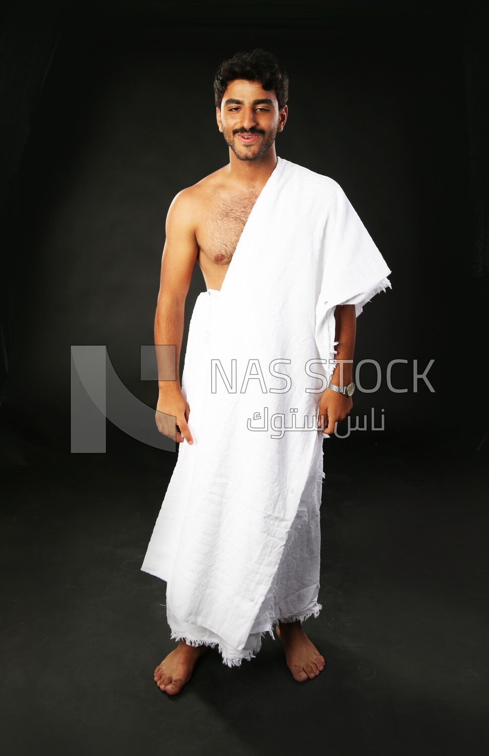 A man wearing an ihram dress