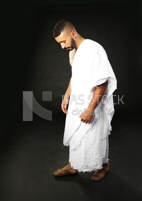 A man wearing an ihram dress