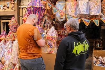 Two men buy lanterns in Cairo, Egypt