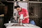 Egyptian seller who makes Qatayef