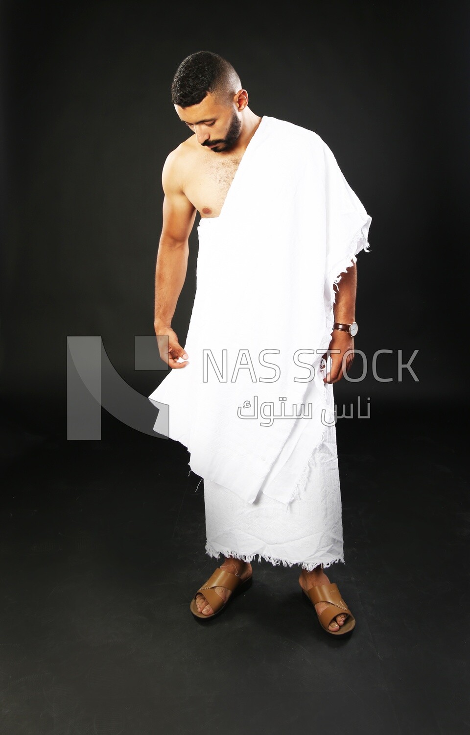 A man wearing an ihram dress