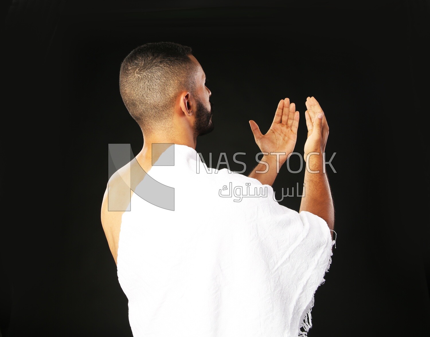 A man wearing an ihram dress