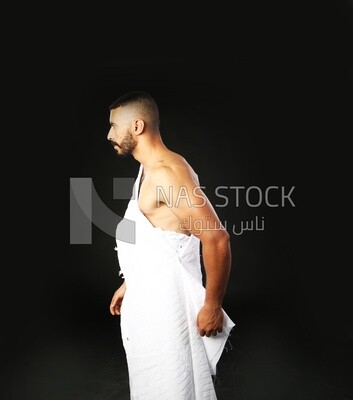 A man wearing an ihram dress