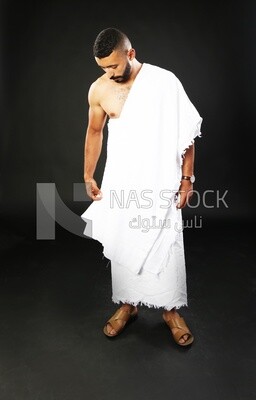 A man wearing an ihram dress