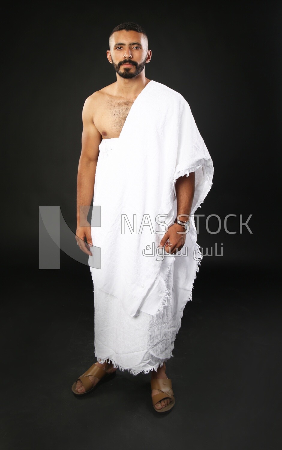 A man wearing an ihram dress