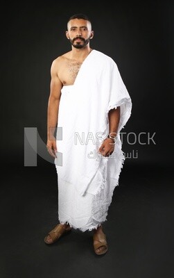 A man wearing an ihram dress