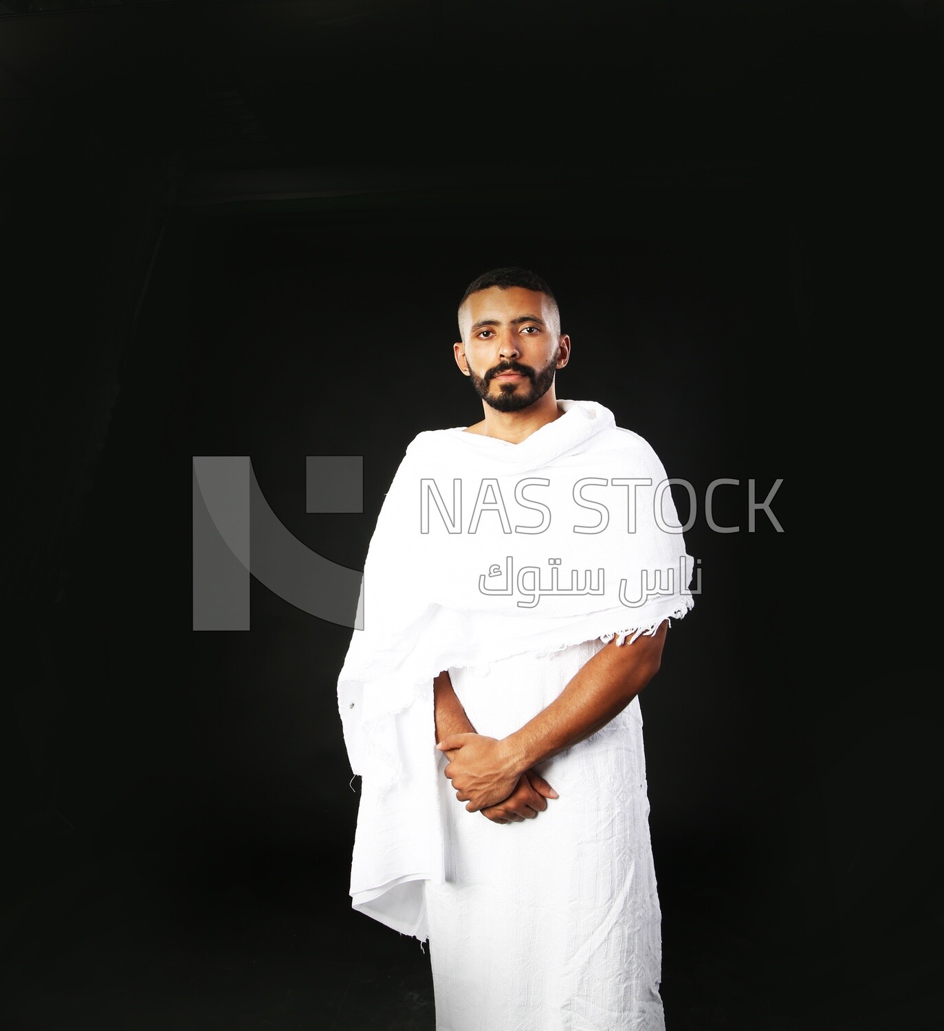 A man wearing an ihram dress