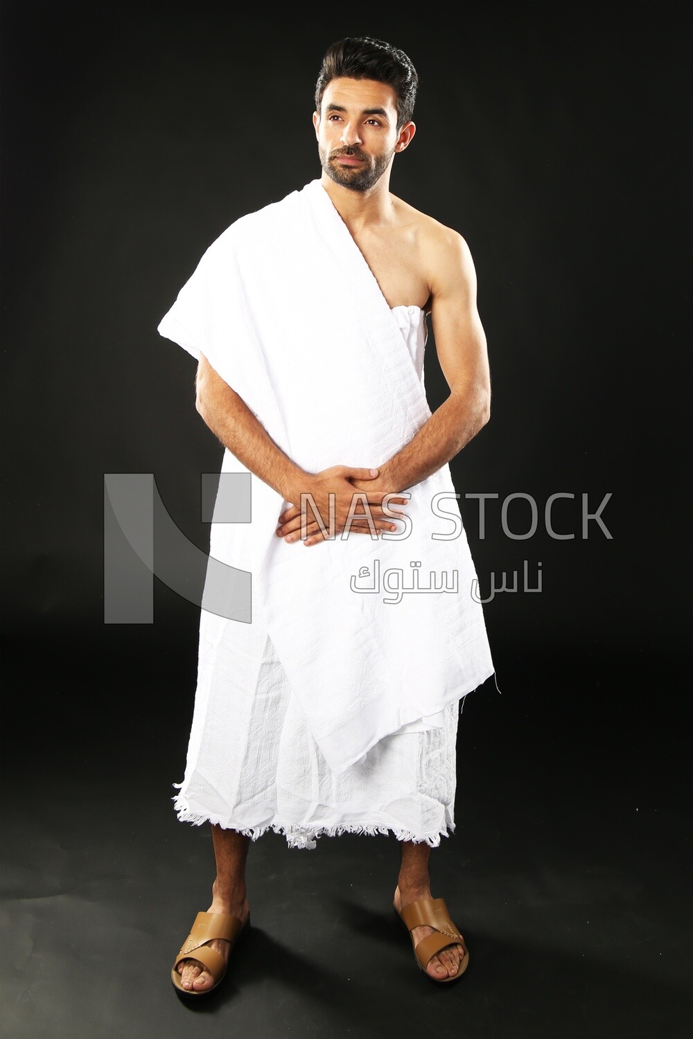 A man wearing an ihram dress