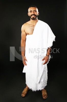 A man wearing an ihram dress