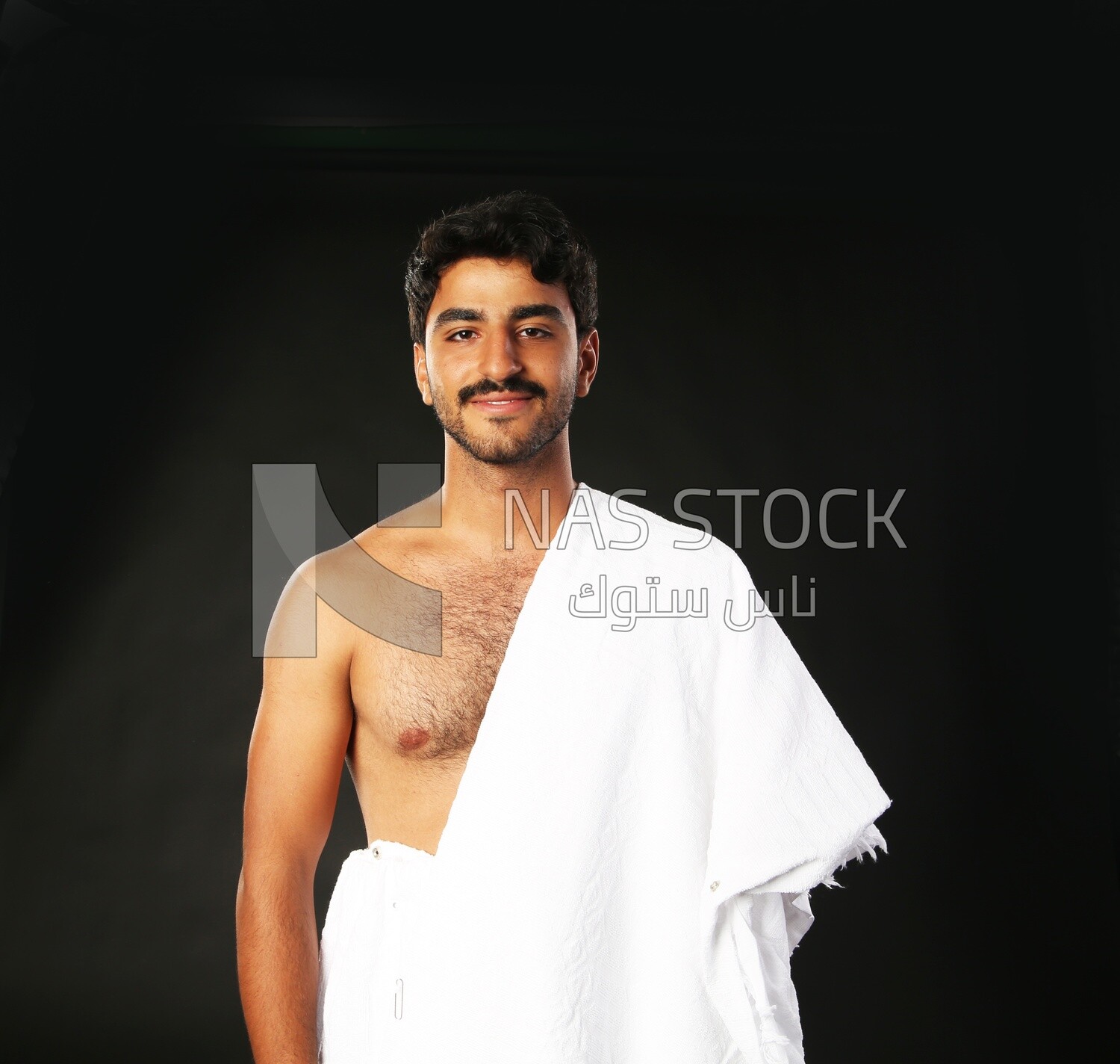 A man wearing an ihram dress