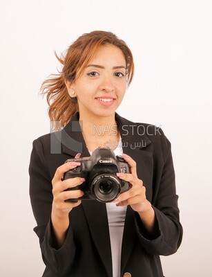 A woman holding a camera
