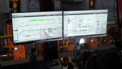 Computer screens in a steel factory , iron and steel production