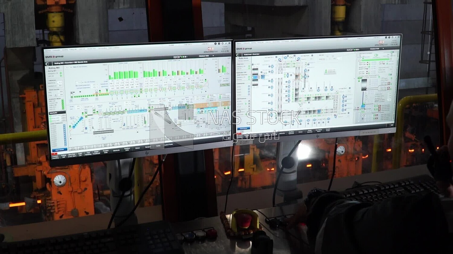 Computer screens in a steel factory , iron and steel production