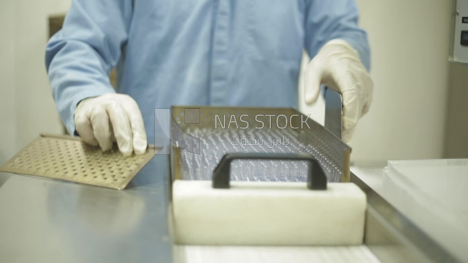 worker collects injection ampoules