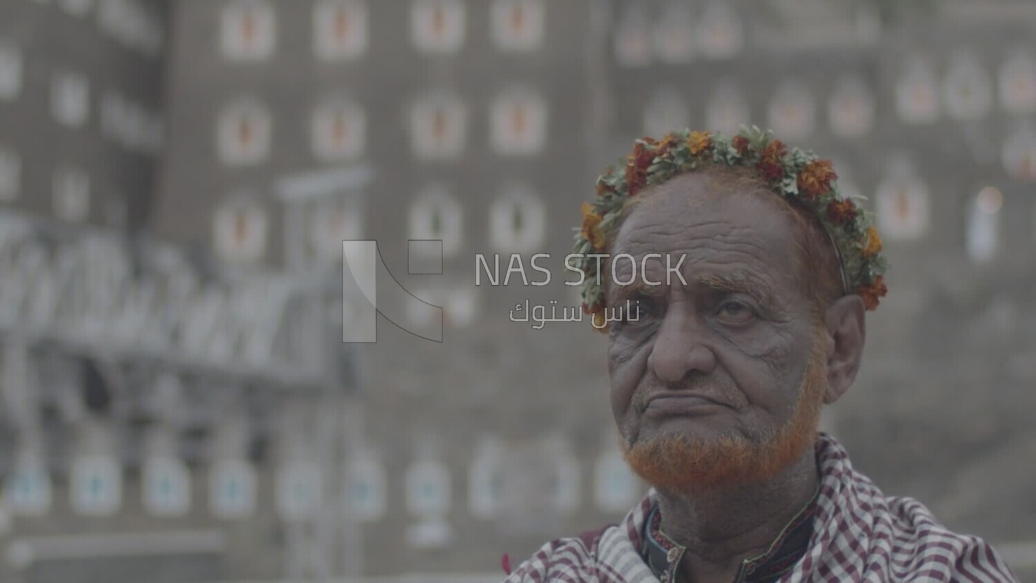 Saudi man wearing a wreath of Asiri roses, southern folk costume, Rijal Almaa village, Asir, Saudi Arabia