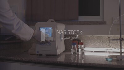 a doctor using the computer in the lab