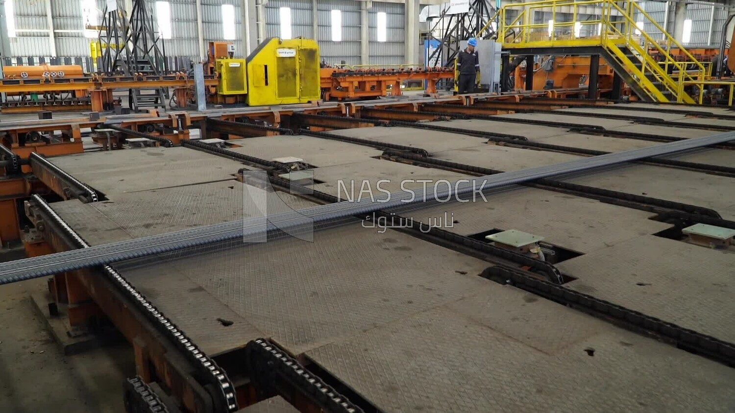 Concrete bars on the conveyor belt in the iron and steel factory