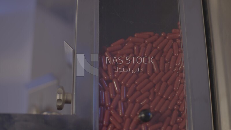 Red tablets in the factory machine