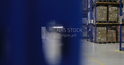 Large warehouse full of shelves and boxes